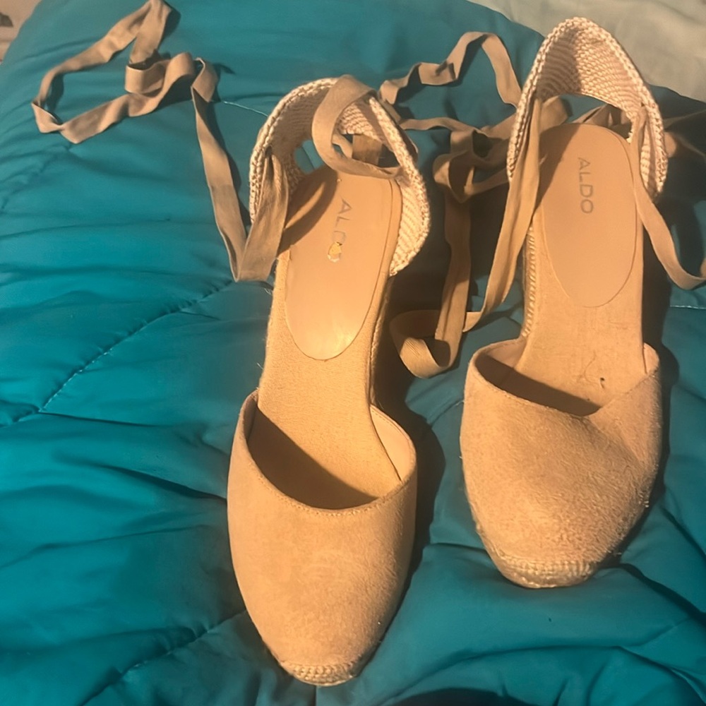 ALDO wedges with tie straps. About three inches at the heel. Tan color. Size 10